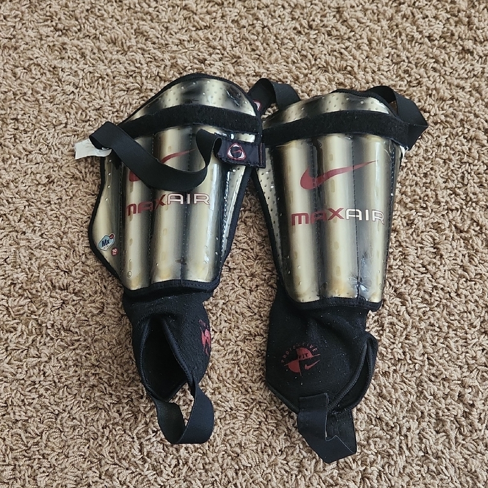 Nike Gold and Black Shin Guards